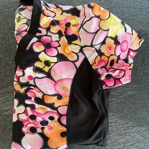 White cross multi-colored scrub top